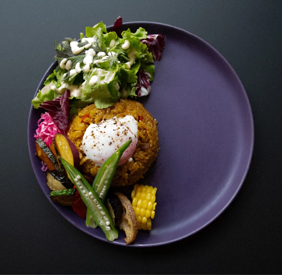 Spiced dry curry  with a soft-boiled egg