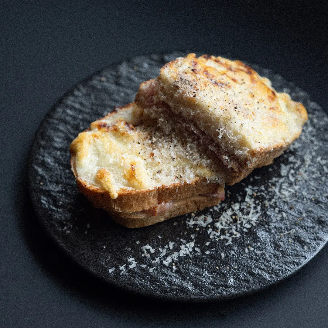 Croque monsieur  with parmigiano and olive oil