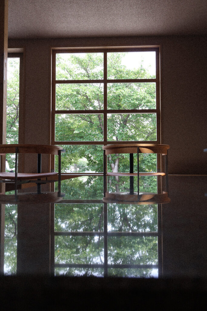 The interior, with greenery through a large window