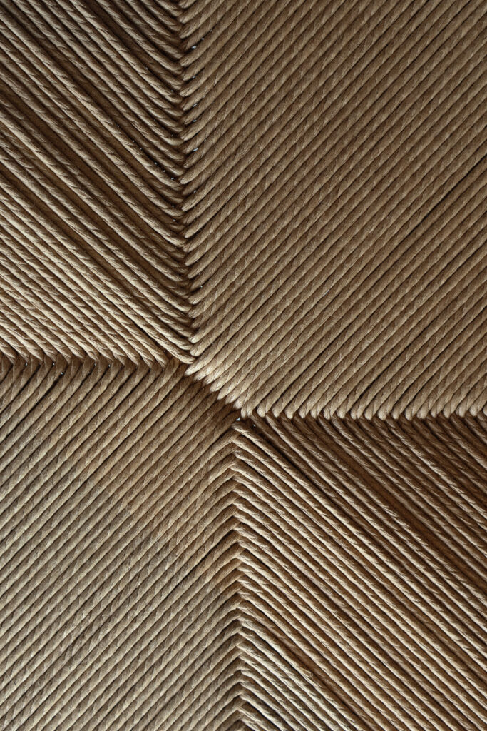 Light falling on a woven seat
