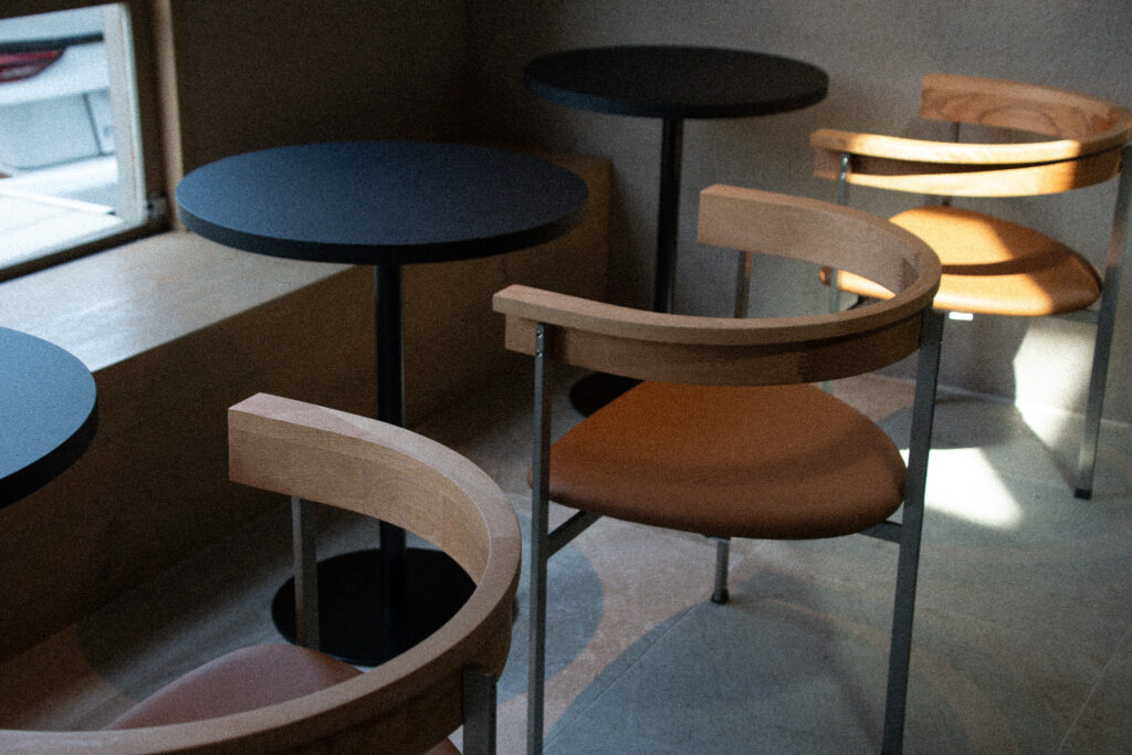 Table seats lined up by the window