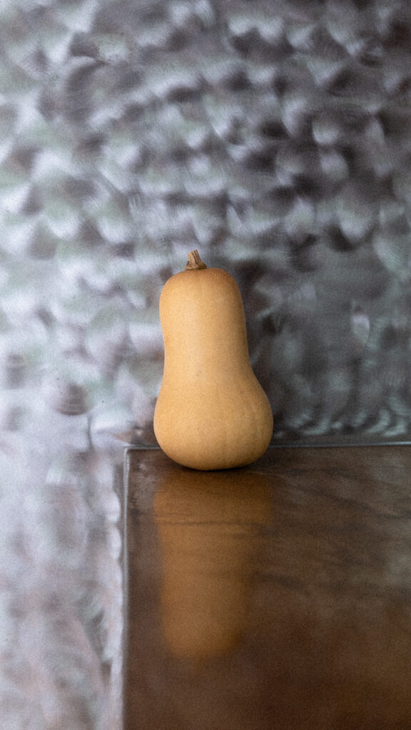 Seasonal fruit placed against the wall