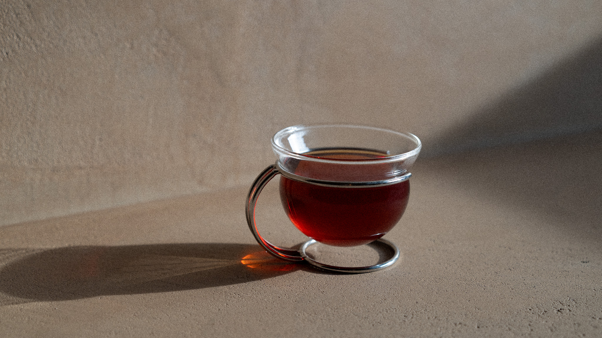 A drink poured into a glass cup