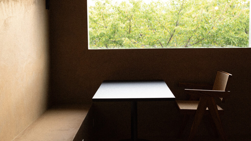 Second-floor seats with greenery outside the window